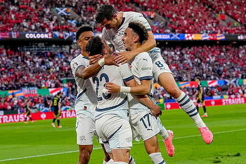 Xherdan Shaqiri and team mates celebrate after scorig a goal
